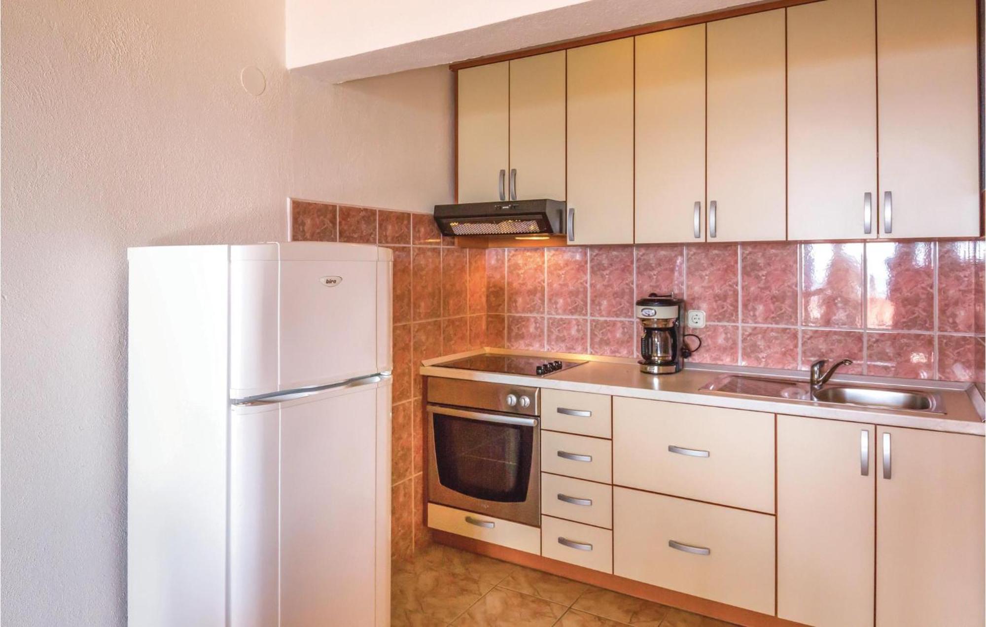 Nice Apartment In Makarska With House Sea View Bagian luar foto